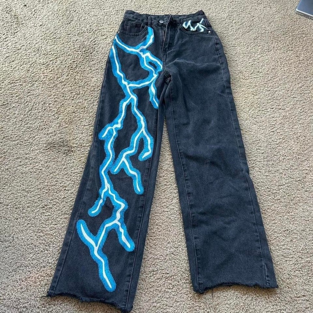 Black and blue lightning bolt jeans